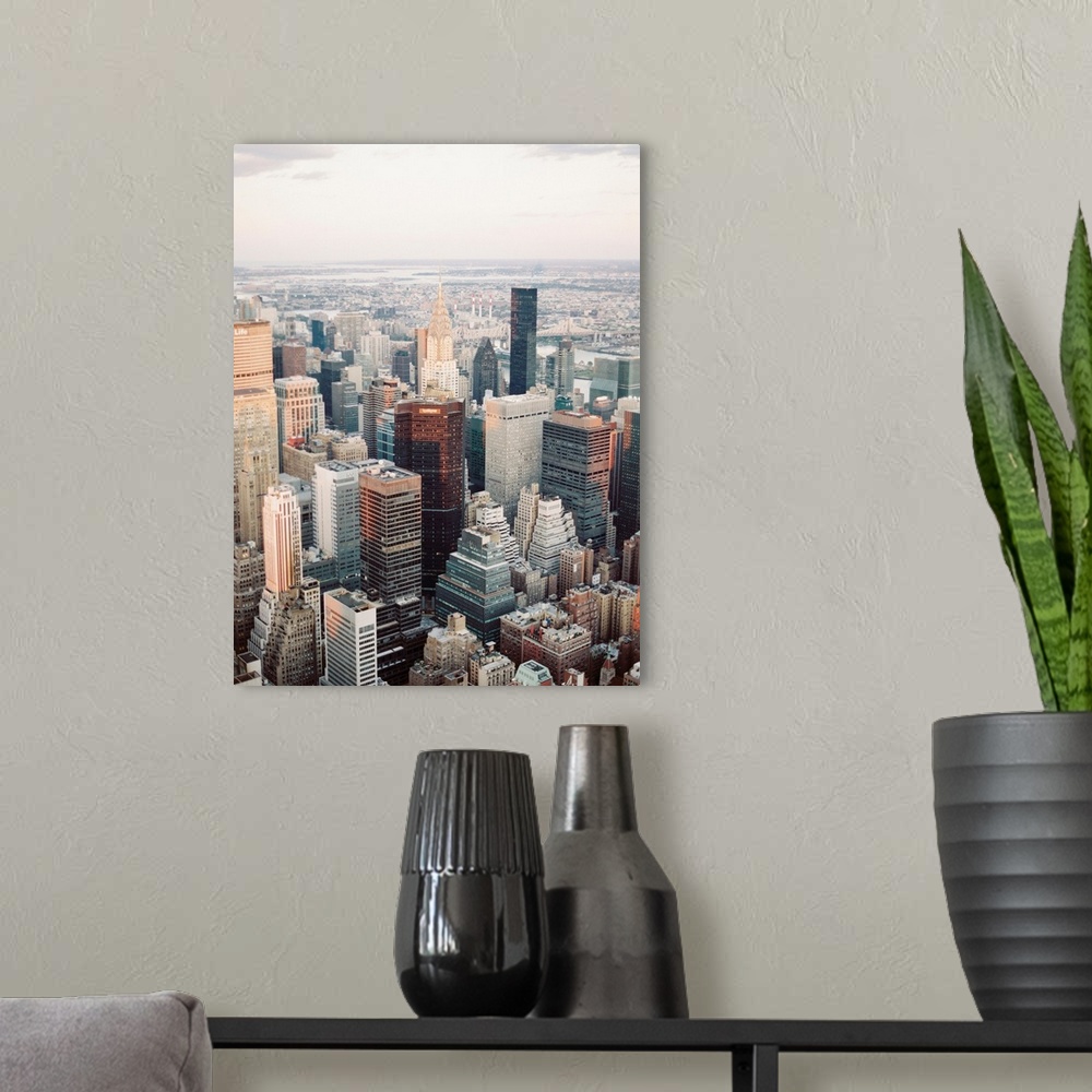 A modern room featuring Photograph of the Empire State Building and surrounding buildings, Manhattan, New York City.