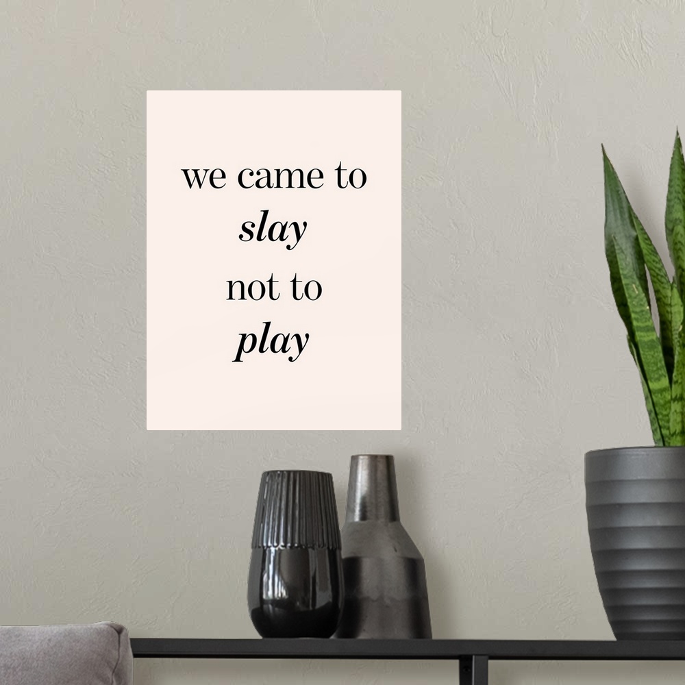A modern room featuring Slay Not Play