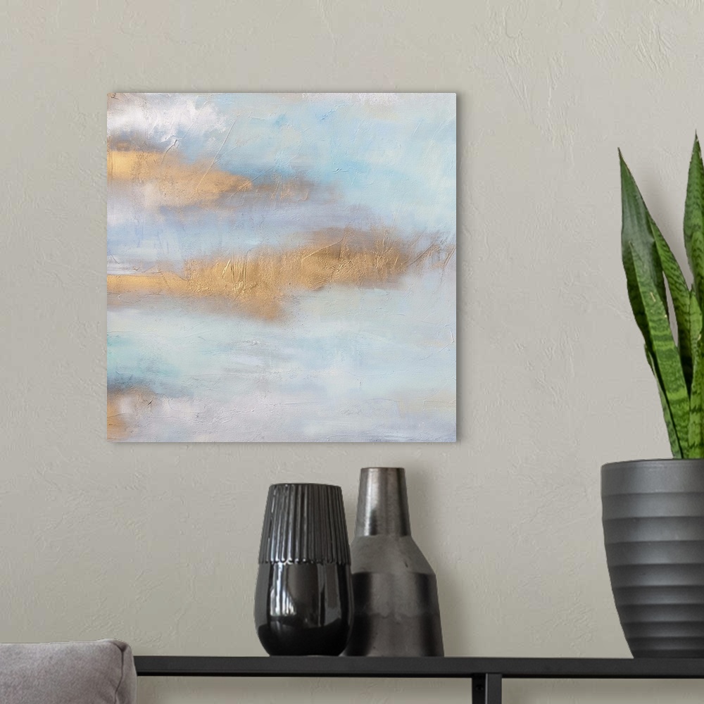 A modern room featuring Abstract artwork in pale blue shades with copper streaks.