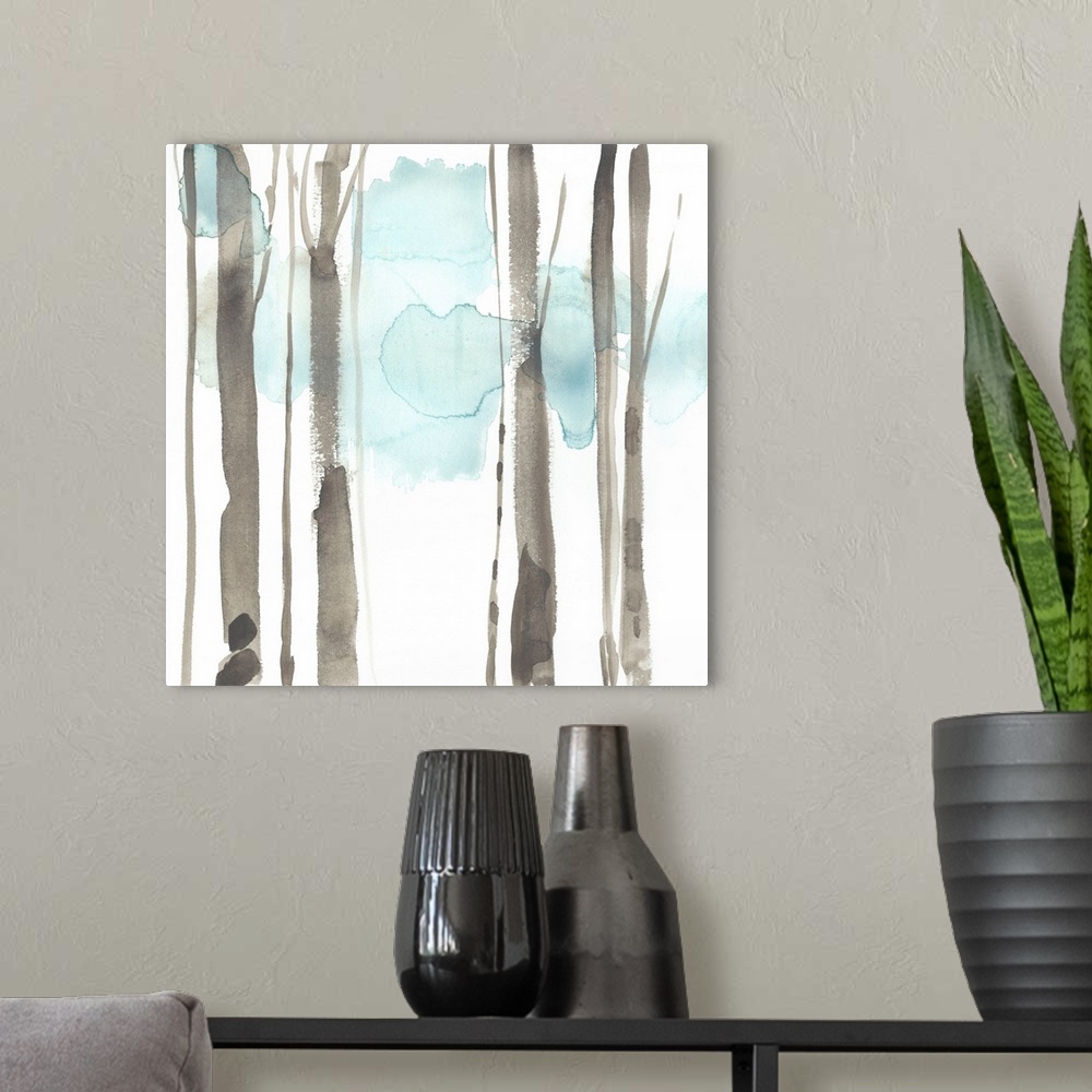A modern room featuring Square watercolor painting of abstract tree trunks in brown against a white background.