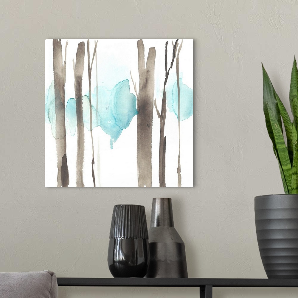 A modern room featuring Square watercolor painting of abstract tree trunks in brown against a white background.