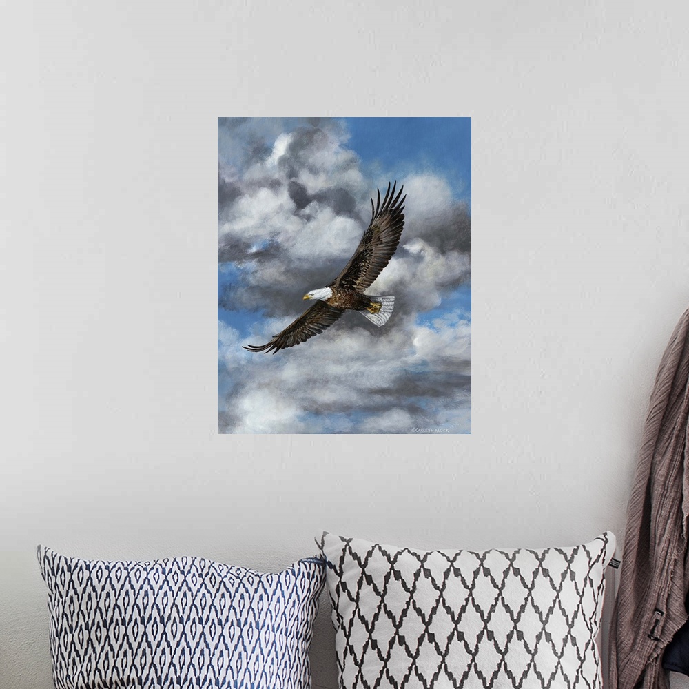 A bohemian room featuring Contemporary painting of a bald eagle in mid flight in blue sky with fluffy clouds.