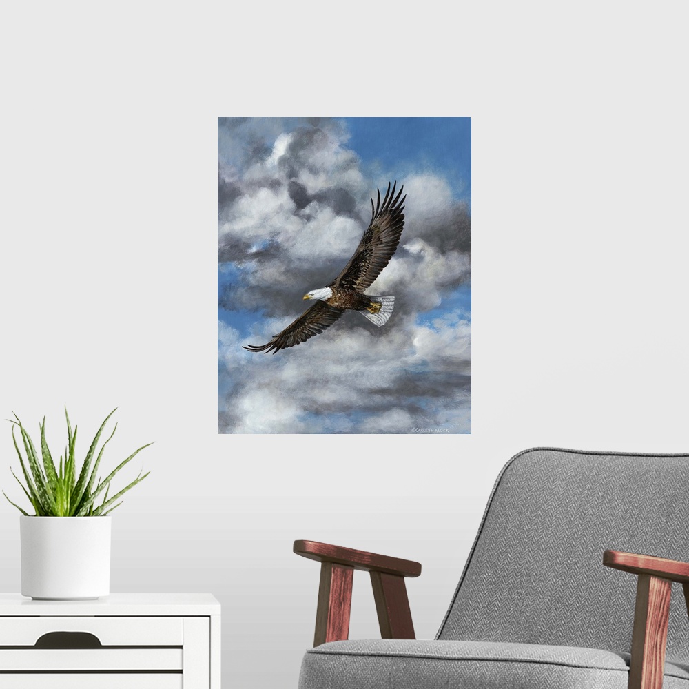 A modern room featuring Contemporary painting of a bald eagle in mid flight in blue sky with fluffy clouds.