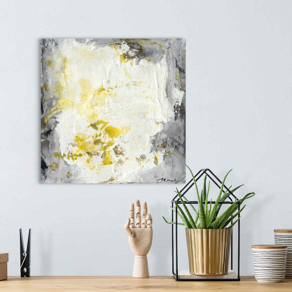 A bohemian room featuring Abstract painting with a heavy impasto effect with yellow splatters on white and grey.