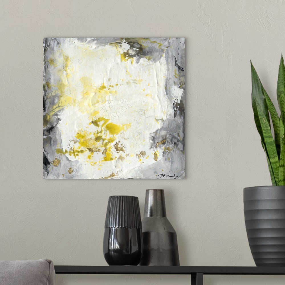 A modern room featuring Abstract painting with a heavy impasto effect with yellow splatters on white and grey.