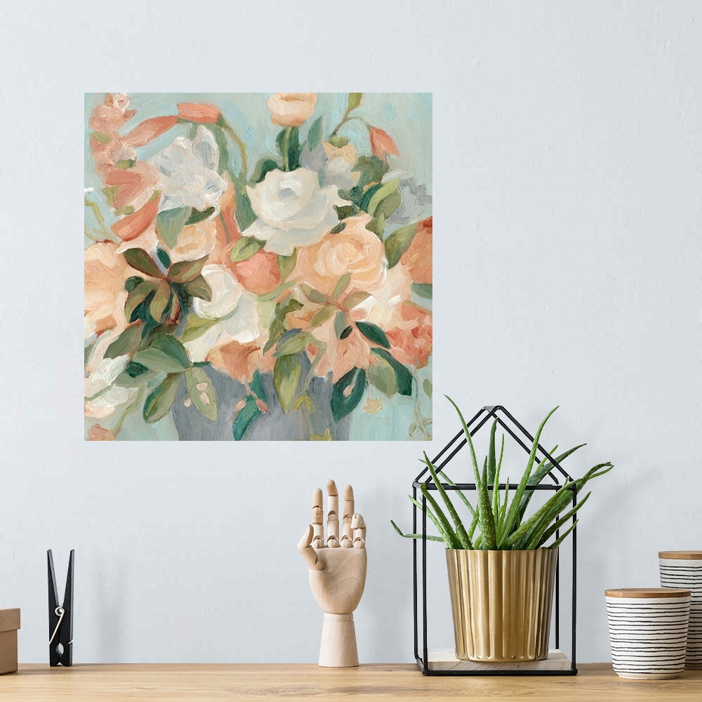 A bohemian room featuring Square painting of a bouquet of soft pastel colored flowers against a pale blue backdrop.