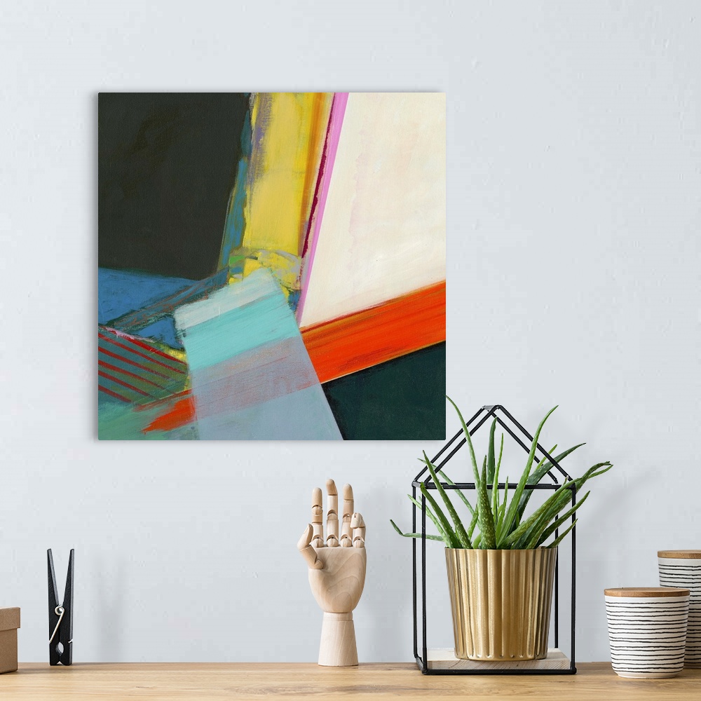 A bohemian room featuring Abstract artwork with bright sections of color.