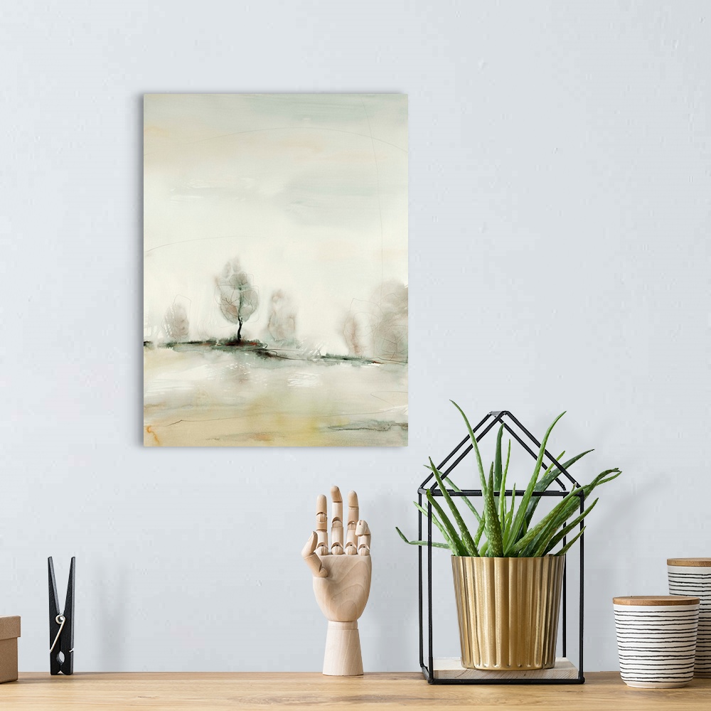 A bohemian room featuring Contemporary landscape art print in neutral colors, with trees on the horizon line.