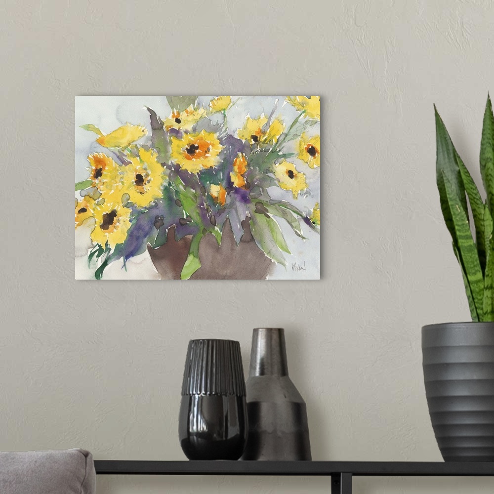 A modern room featuring Watercolor painting of bright yellow daisies in a vase.