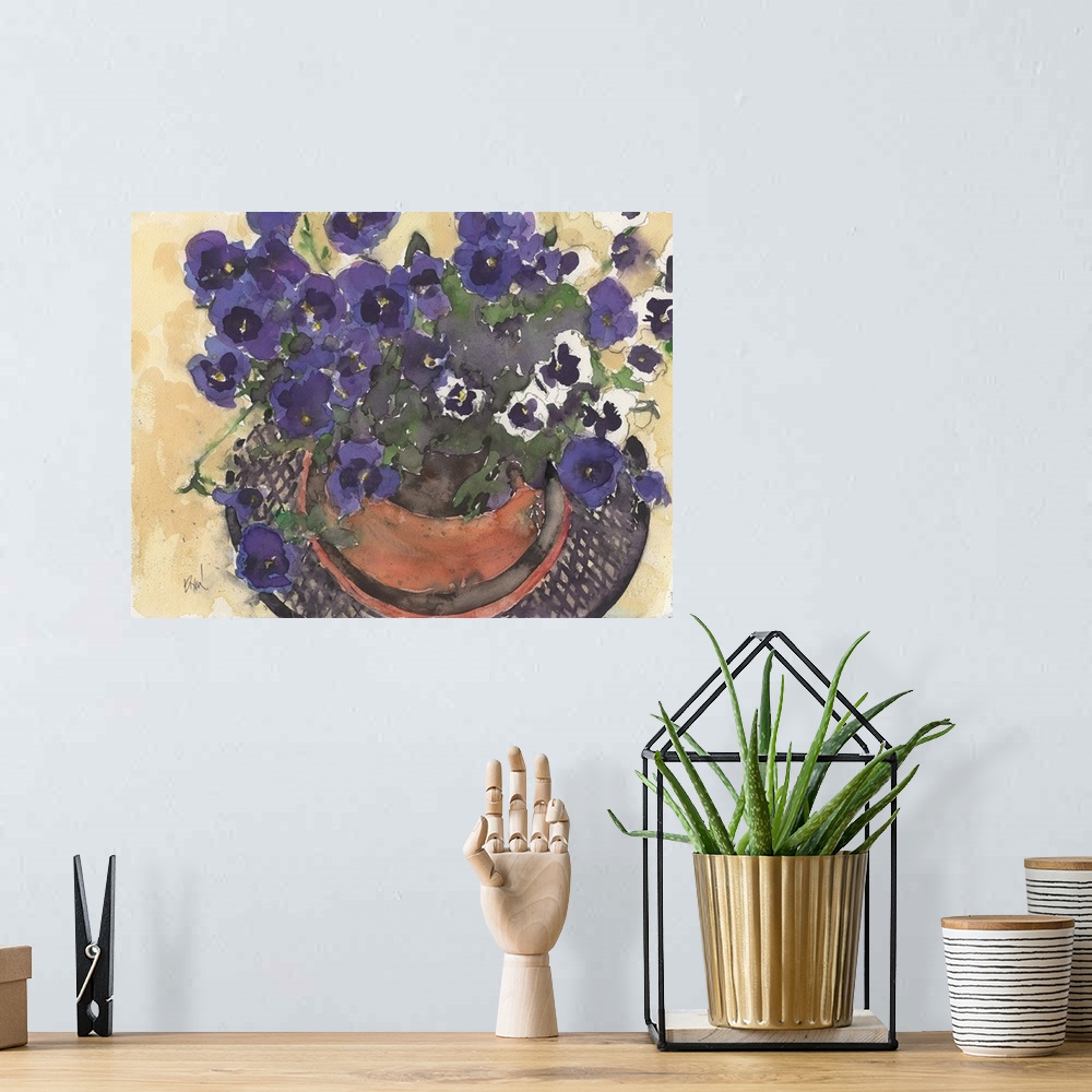 A bohemian room featuring Watercolor painting of bright purple pansies in a pot.