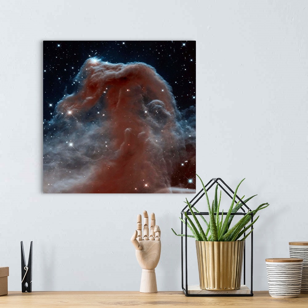 A bohemian room featuring Square photograph of space.