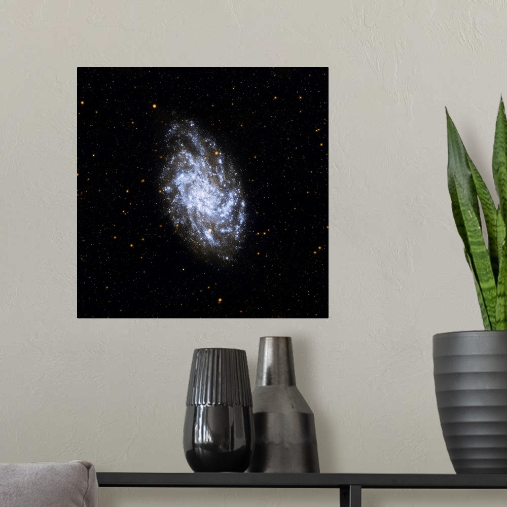 A modern room featuring NASA's Galaxy Evolution Explorer Mission celebrates its sixth anniversary studying galaxies beyon...