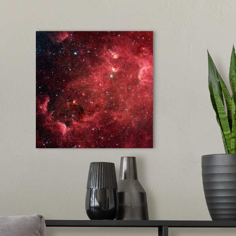 A modern room featuring This infrared image from NASA's Spitzer Space Telescope shows a swirling landscape of stars known...