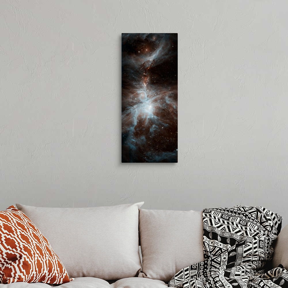 A bohemian room featuring Panel photograph of space with blue and orange tones.