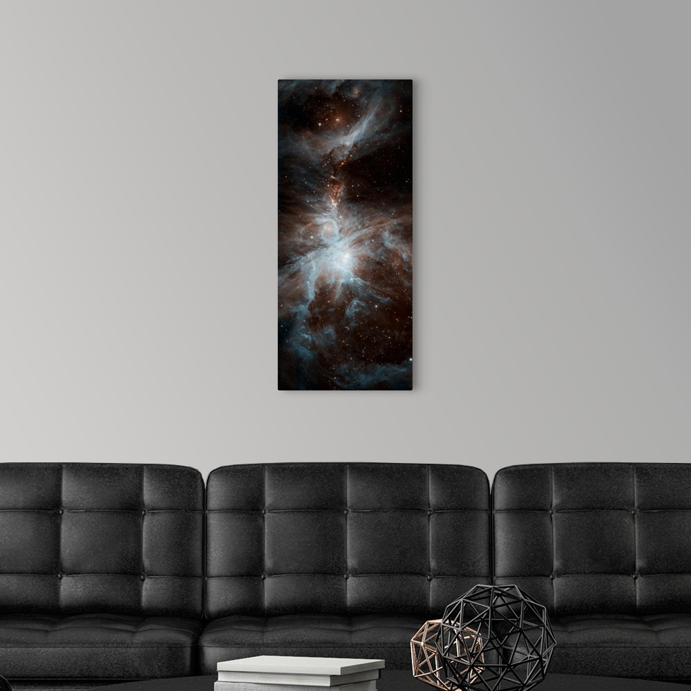 A modern room featuring Panel photograph of space with blue and orange tones.