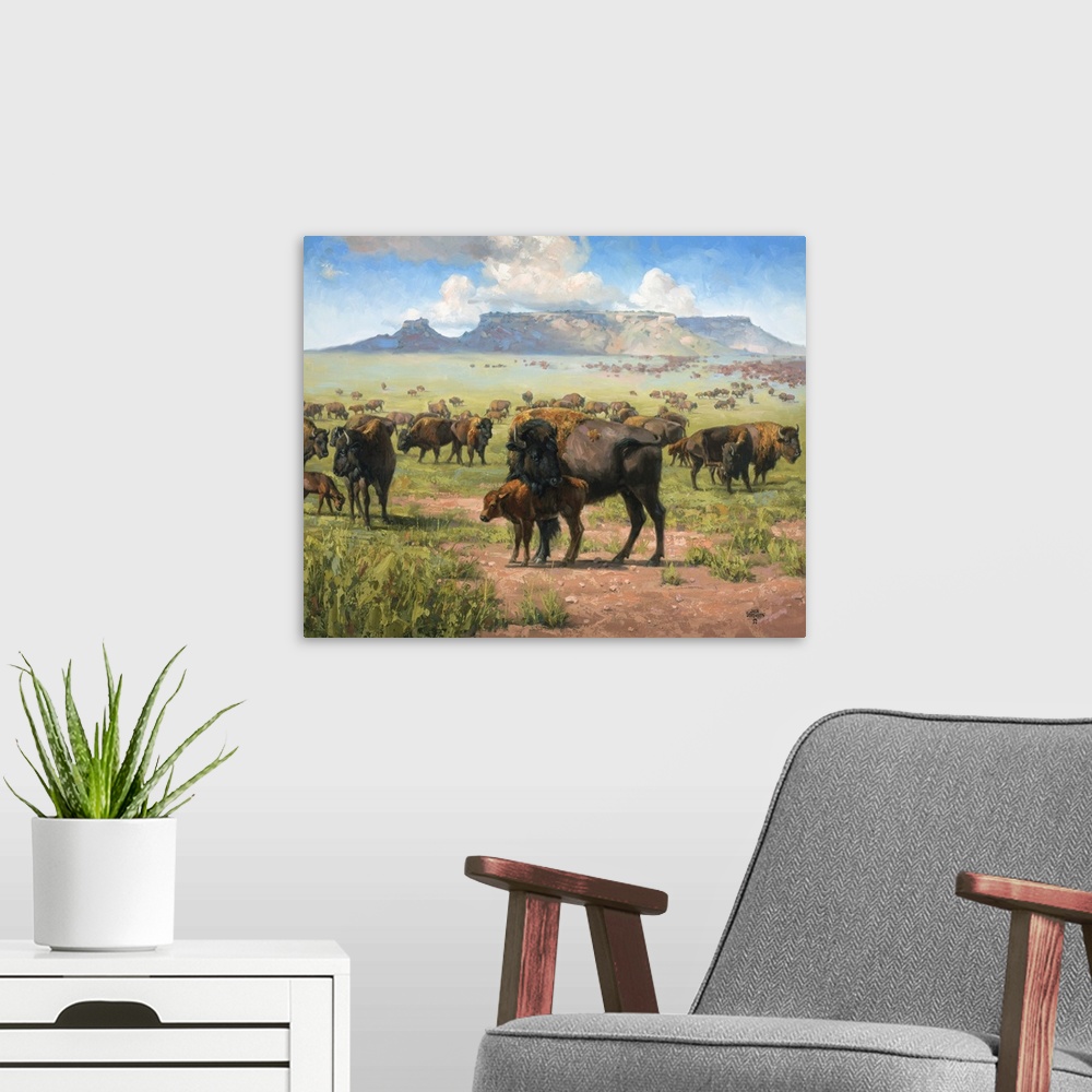 A modern room featuring Contemporary artwork of lively brush strokes that create a serene western landscape filled with r...