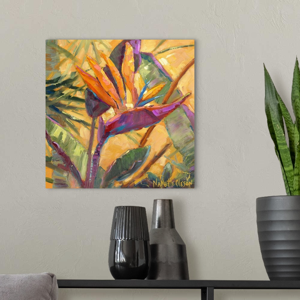 A modern room featuring Contemporary artwork of a tropical Bird of Paradise flower.