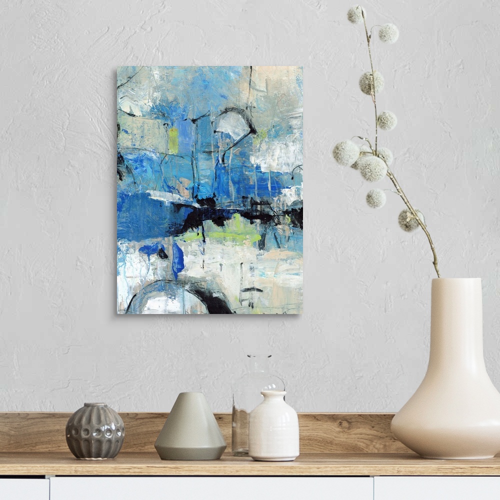 A farmhouse room featuring This abstract piece of artwork shows multiple techniques of painting with a cool color palate.