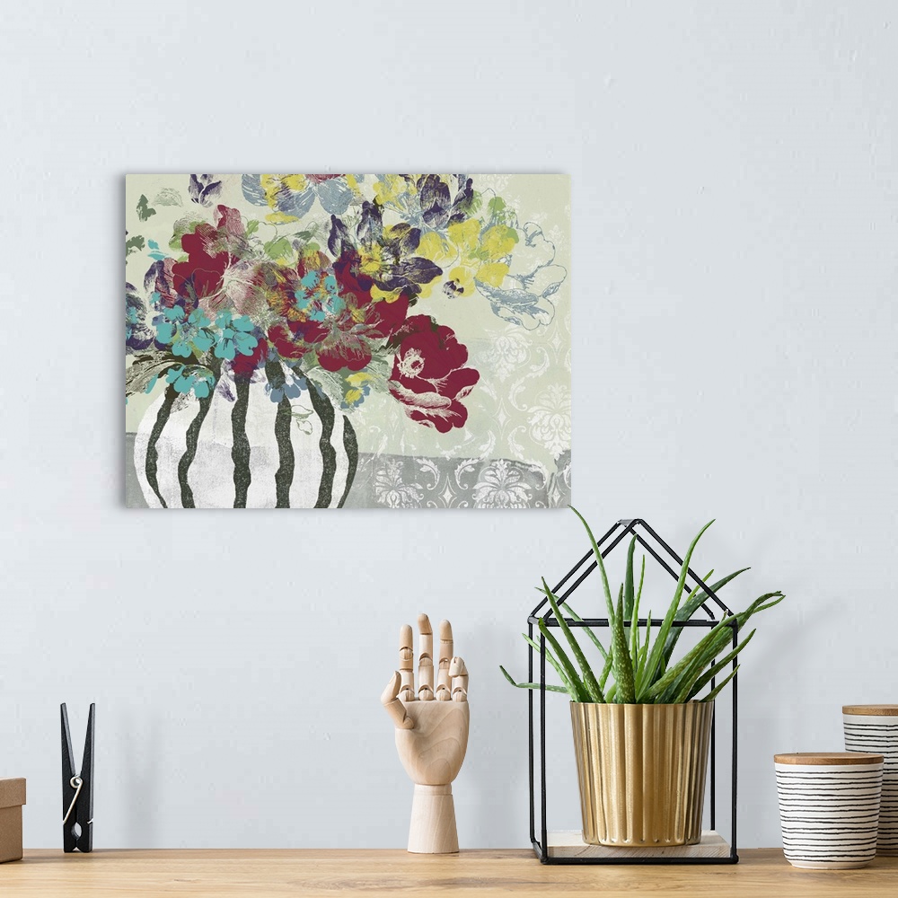A bohemian room featuring Contemporary artwork of a bouquet of flowers in a vase against a floral patterned background.