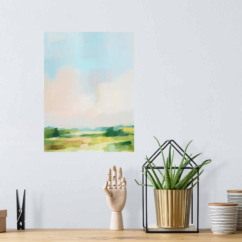 A bohemian room featuring Contemporary abstract painting highlighting a pale blue sky over a green landscape.