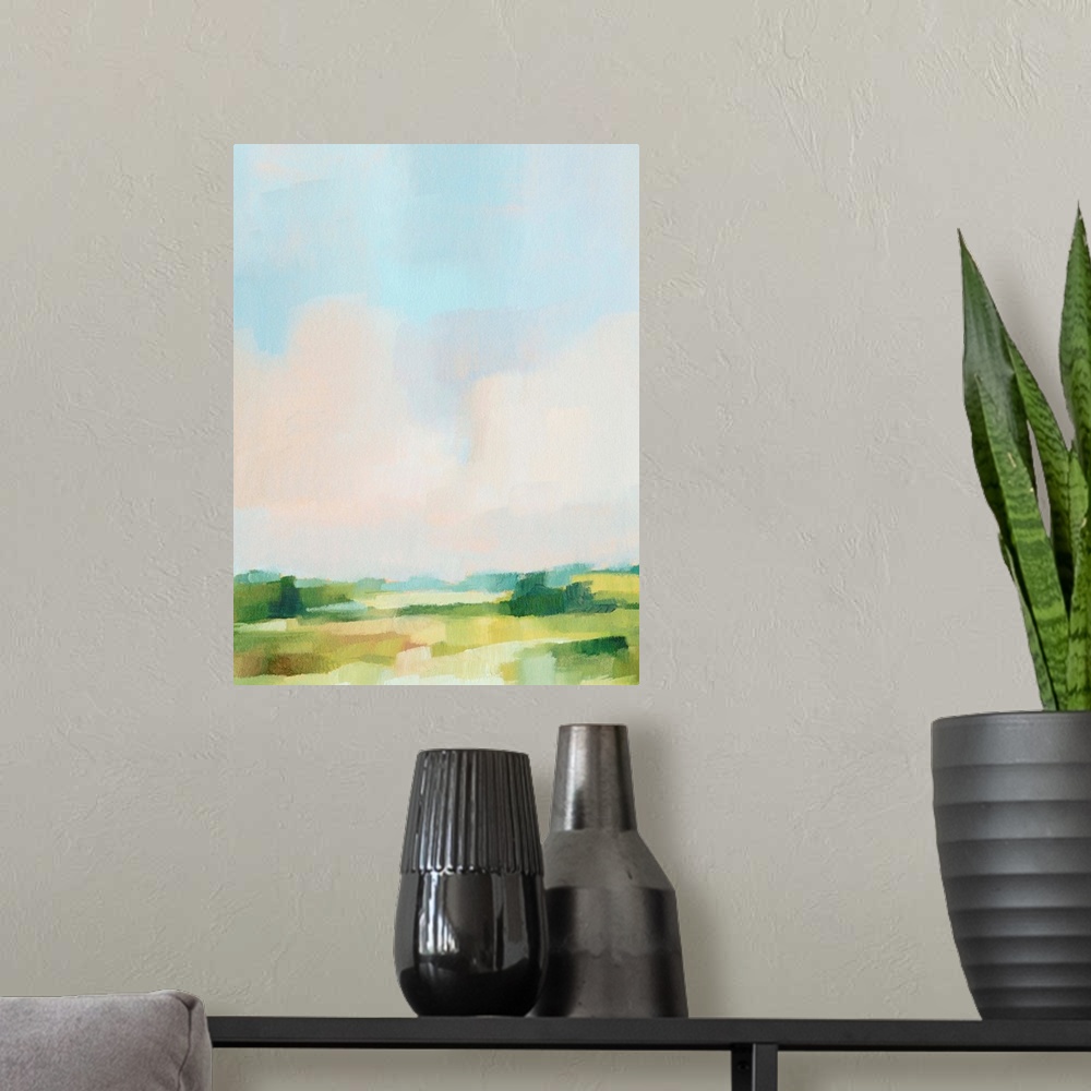 A modern room featuring Contemporary abstract painting highlighting a pale blue sky over a green landscape.
