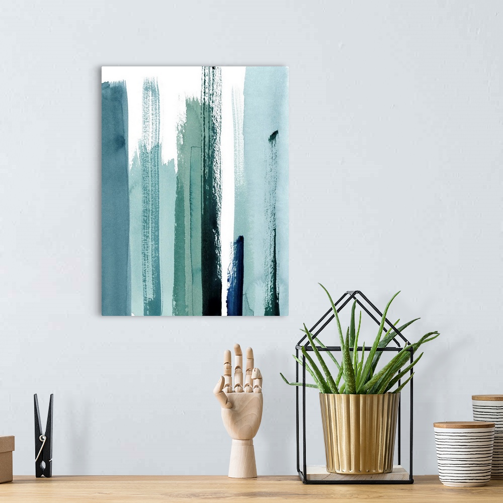 A bohemian room featuring Contemporary abstract painting of watercolor brush strokes in various shades of blue.