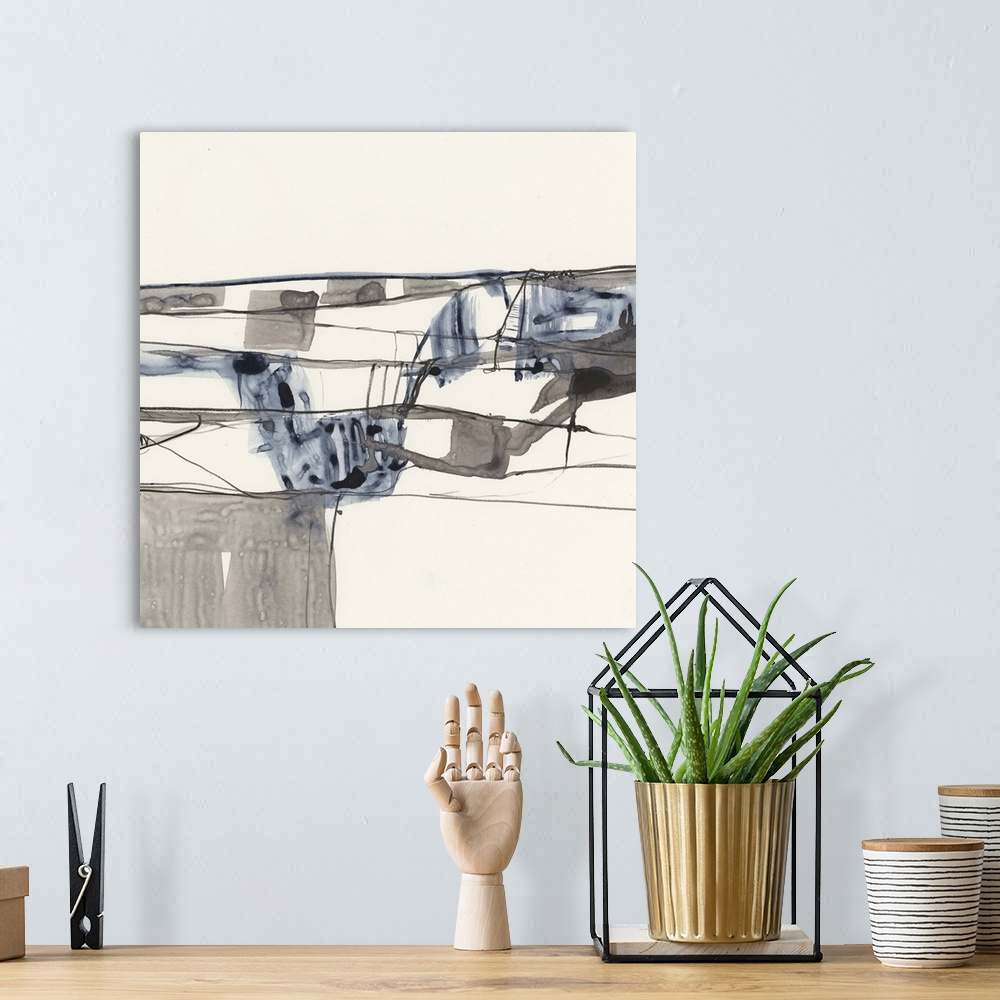 A bohemian room featuring Abstract painting of intersecting lines and shapes on a tan background.