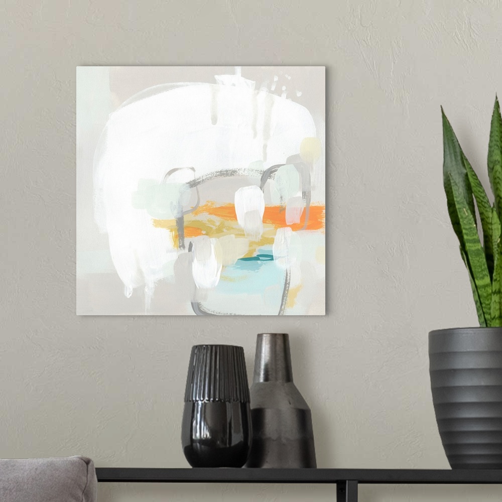 A modern room featuring Contemporary abstract artwork in pale beige tones with pops of orange and teal.