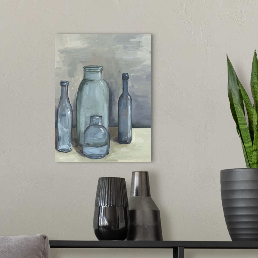 A modern room featuring Contemporary still life painting of a group of glass bottles in different sizes against a neutral...