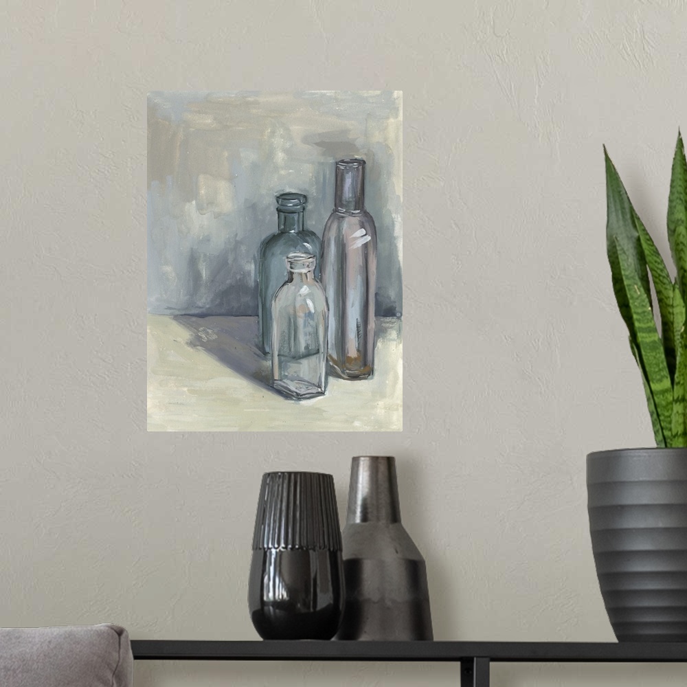 A modern room featuring Contemporary still life painting of a group of glass bottles in different sizes against a neutral...