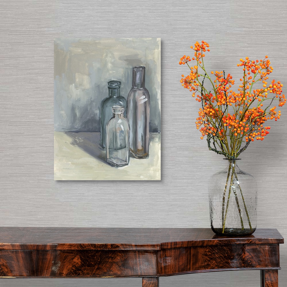 A traditional room featuring Contemporary still life painting of a group of glass bottles in different sizes against a neutral...