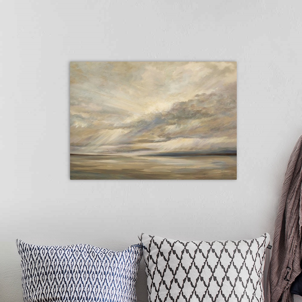 A bohemian room featuring Landscape painting of storm clouds over the ocean, in earthy brown tones.