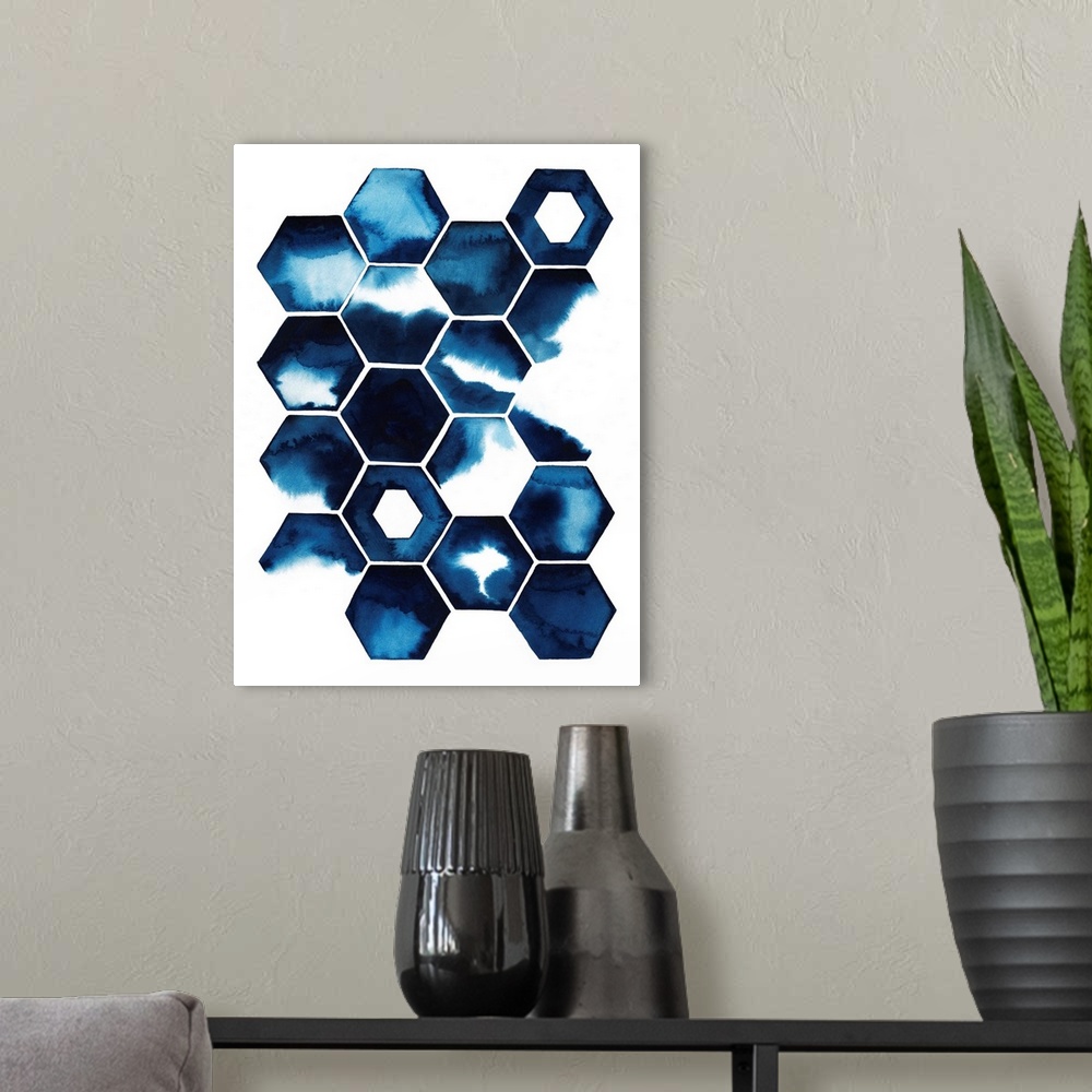 A modern room featuring Tiled honeycomb shapes, each with a dark blue watercolor splash inside.