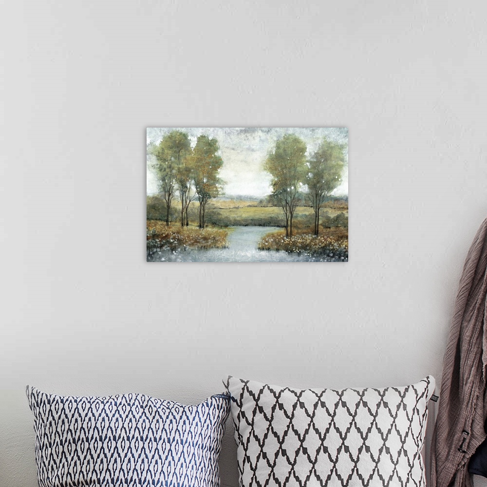A bohemian room featuring Contemporary painting of trees in a meadow by a stream.