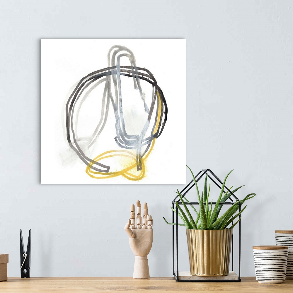 A bohemian room featuring Abstract gestural artwork of yellow and grey lines swirling and intertwining.