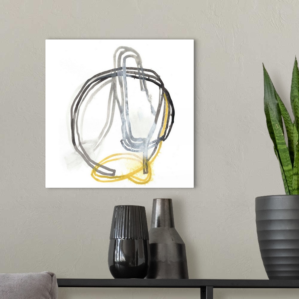 A modern room featuring Abstract gestural artwork of yellow and grey lines swirling and intertwining.