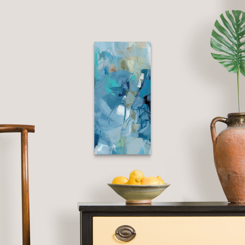 A traditional room featuring Abstract painting using a variety of blue tones.