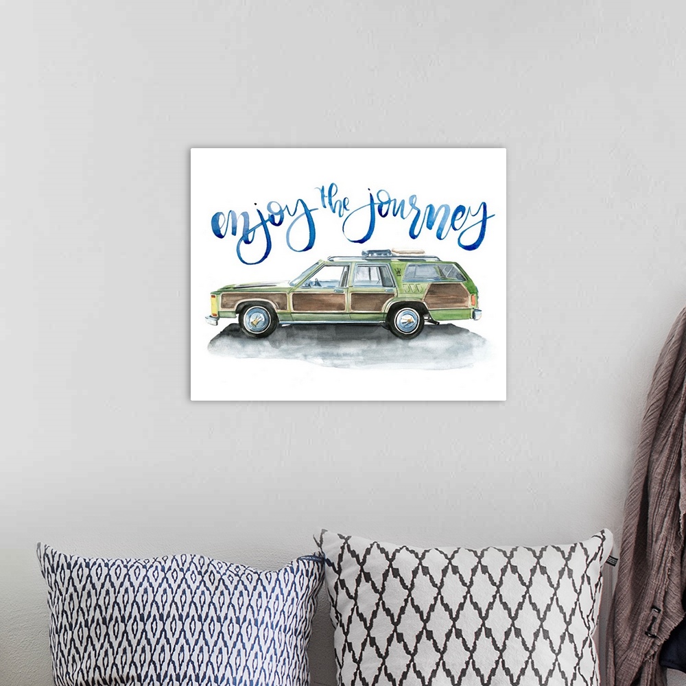 A bohemian room featuring Fun watercolor painting of an old car with text "Enjoy the journey."