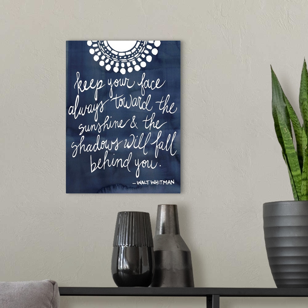 A modern room featuring Handwritten quote in white over a deep navy blue background.