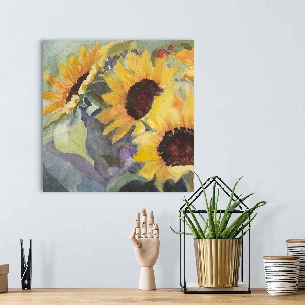 A bohemian room featuring Square watercolor painting of large sunflower blooms.