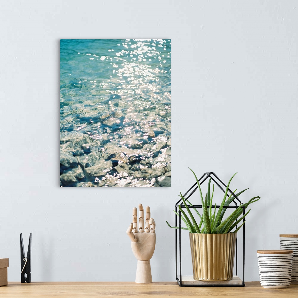 A bohemian room featuring Photograph of sunlight reflecting off of clear blue water, Canmore, Canada.