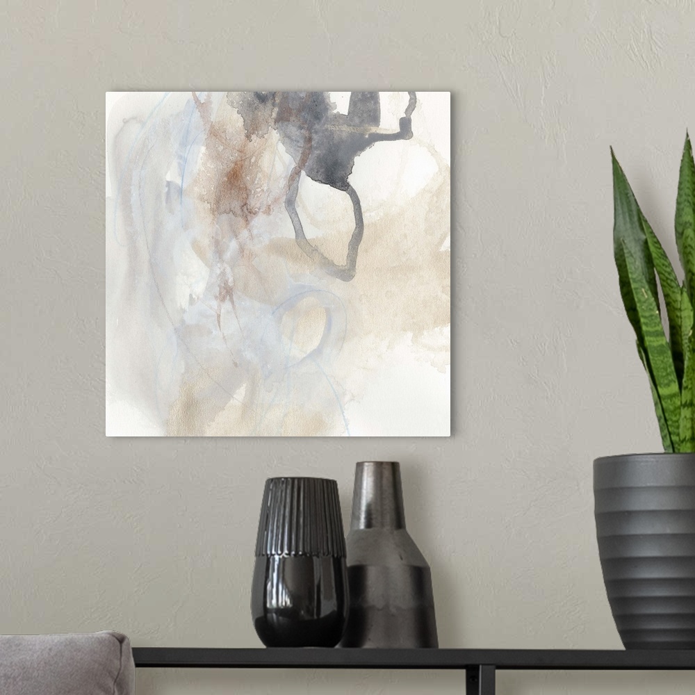 A modern room featuring Abstract watercolor painting in muted earth tones.