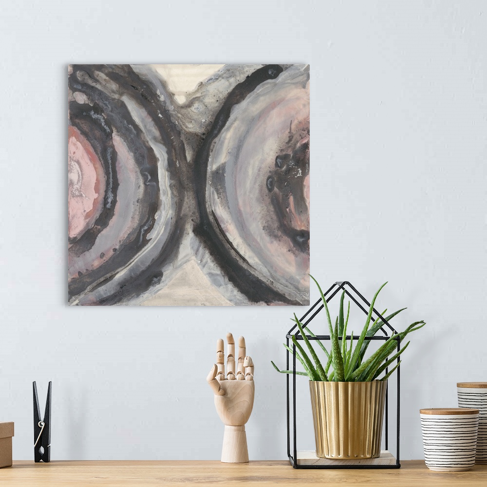 A bohemian room featuring Abstract contemporary art in muted shades of pink, grey, and white.