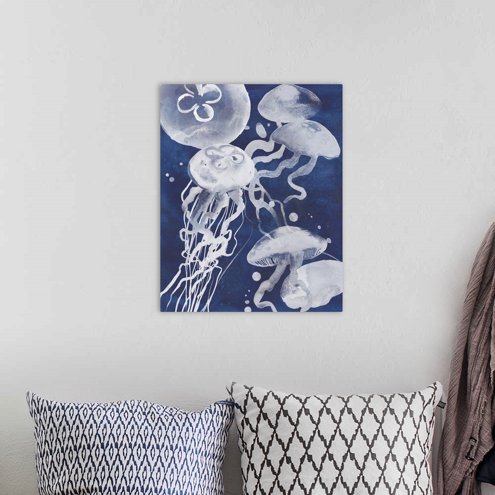A bohemian room featuring Painting of several white jellyfish swimming in the ocean.