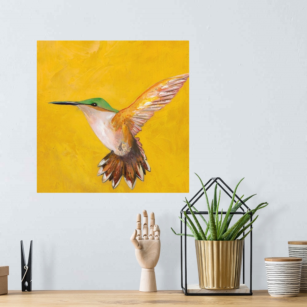 A bohemian room featuring Contemporary painting of a hummingbird hovering against a yellow background.