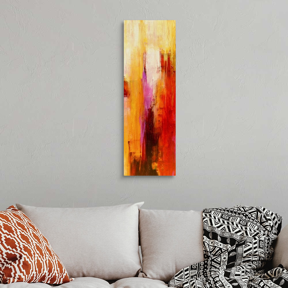 A bohemian room featuring Vertical panoramic painting of vertical brush strokes of warm colors overlapping.