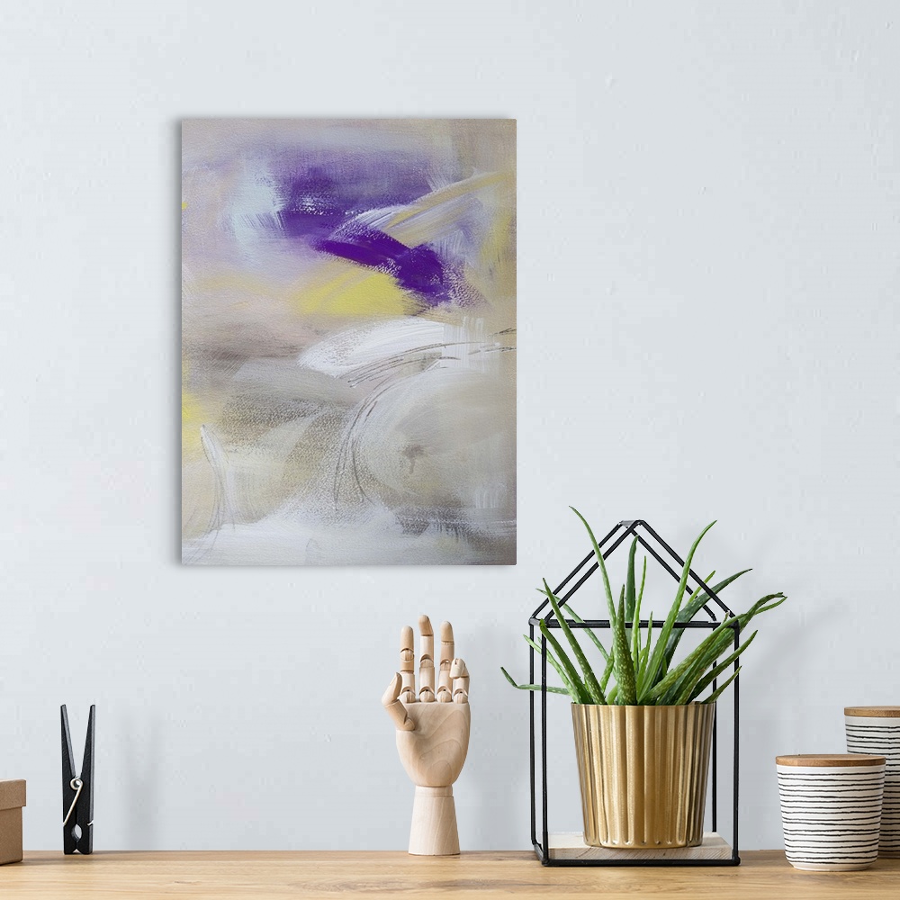 A bohemian room featuring Contemporary abstract painting in white and yellow with dark purple.