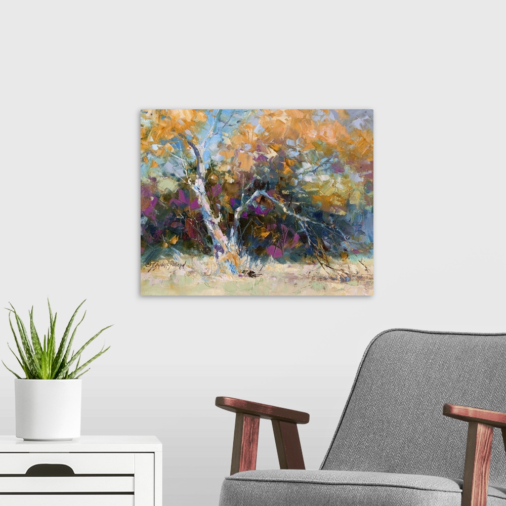 A modern room featuring Contemporary vibrant landscape painting of an autumn foliage tree.