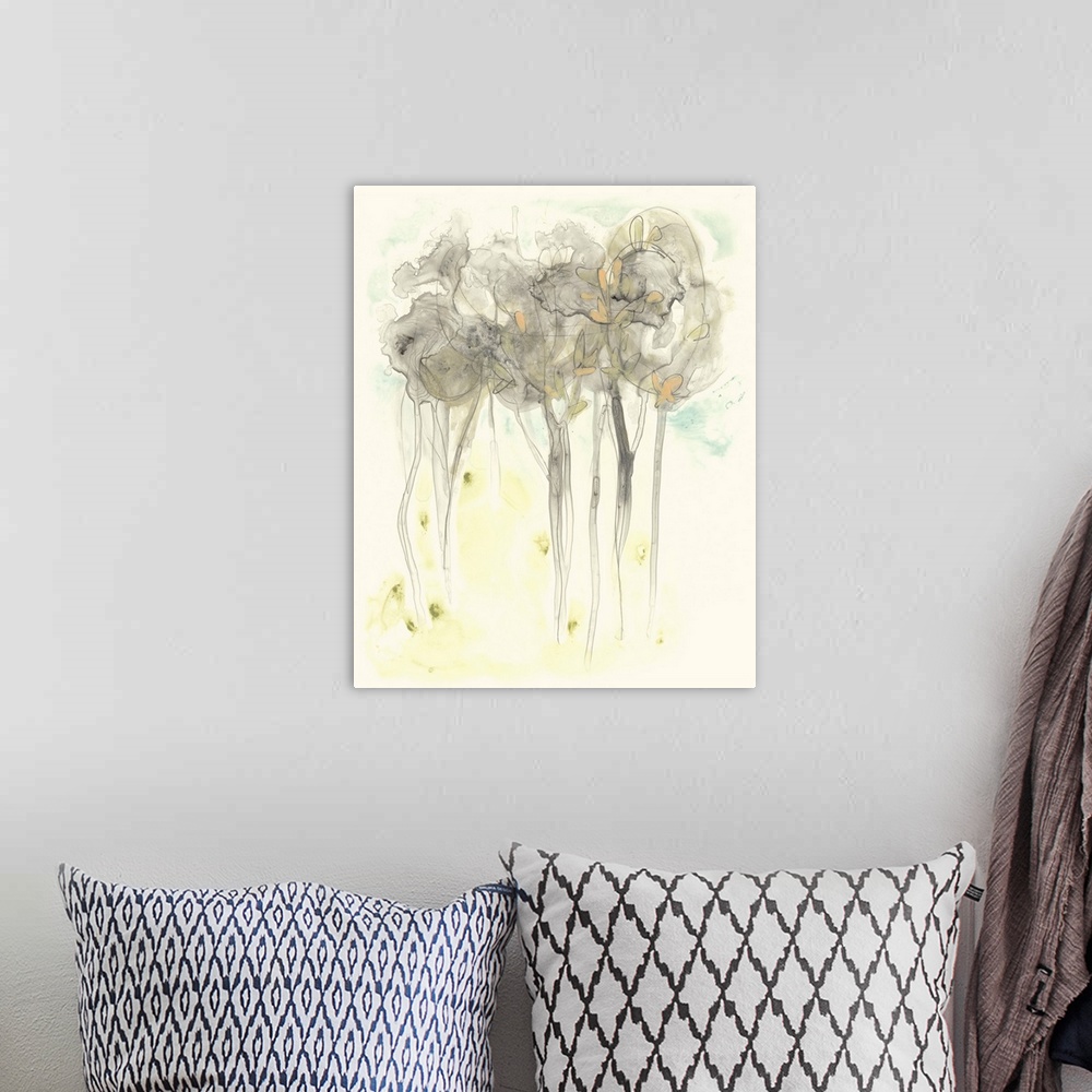 A bohemian room featuring Abstract watercolor painting of a landscape with a gray treeline.