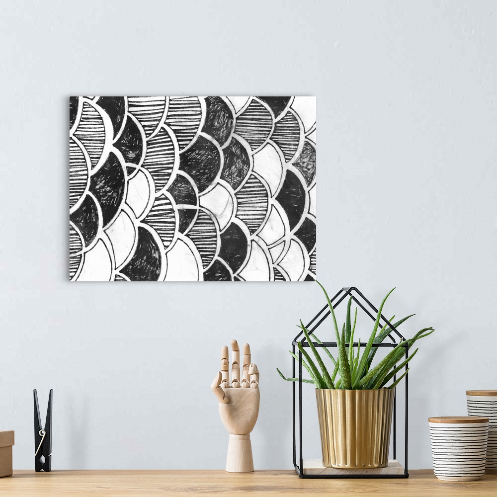 A bohemian room featuring Black and white drawing of patterned scales.